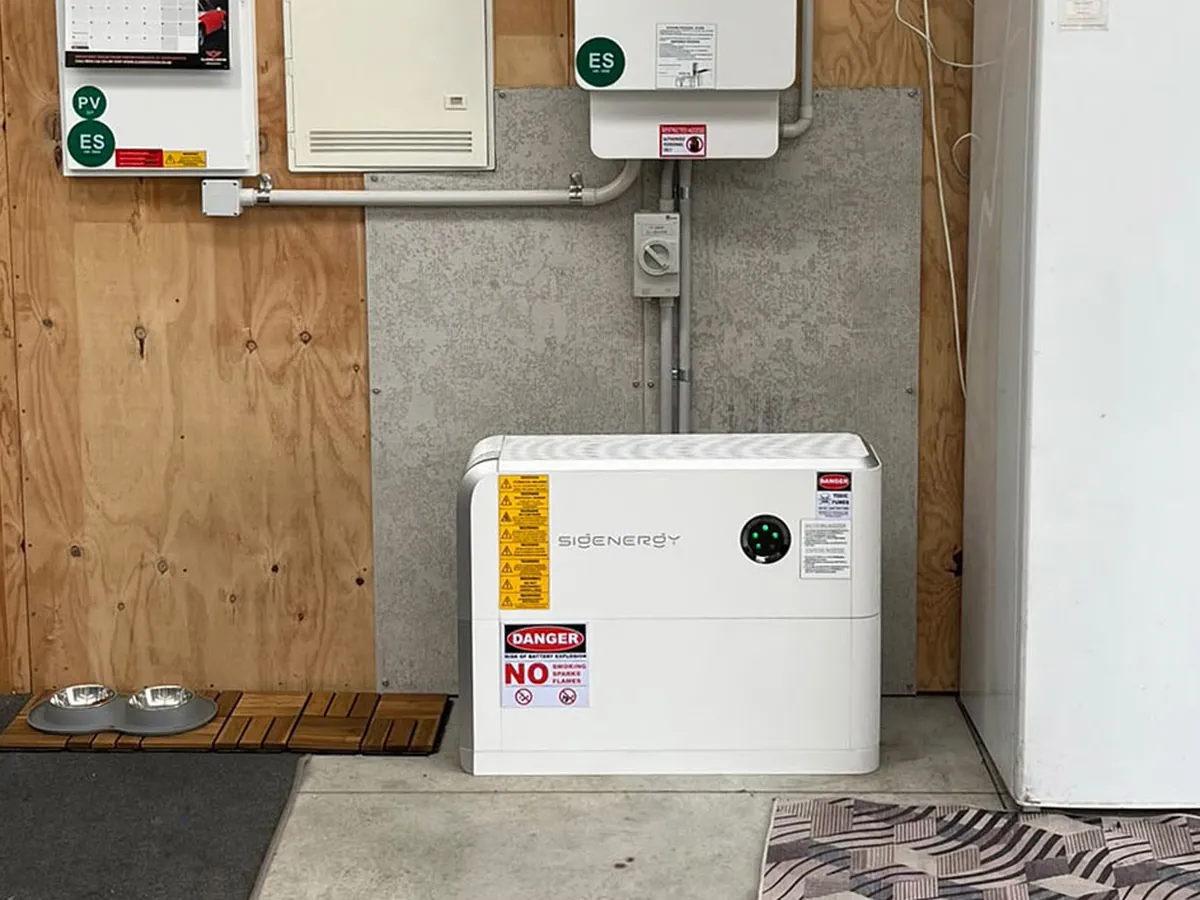 A Sigenergy home battery and inverter installed by EFS Solar in a garage at a Brixton home, Taranaki