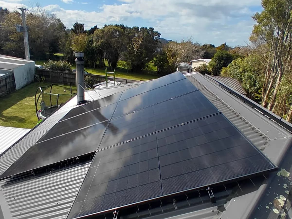 A 6.83kW EFS Solar array on a charcoal metal roof at a home in Egmont Village, Taranaki