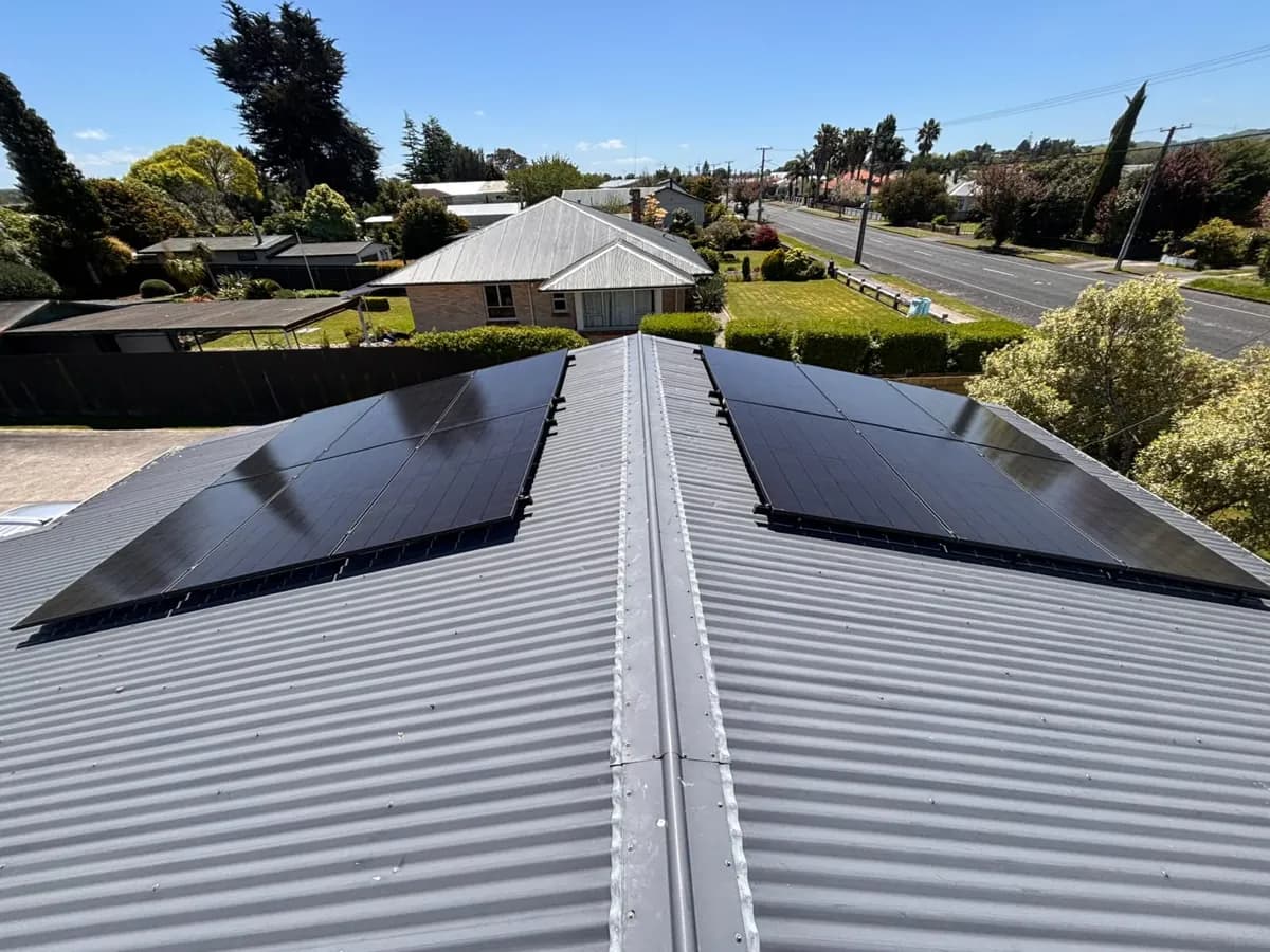 A 5.46kW EFS Solar array split either side of the ridge on a metal roof in Huntly, Waikato