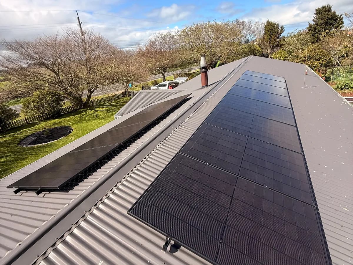 A 5.46kW EFS Solar array on a charcoal metal roof at a rural Kaponga property, Taranaki