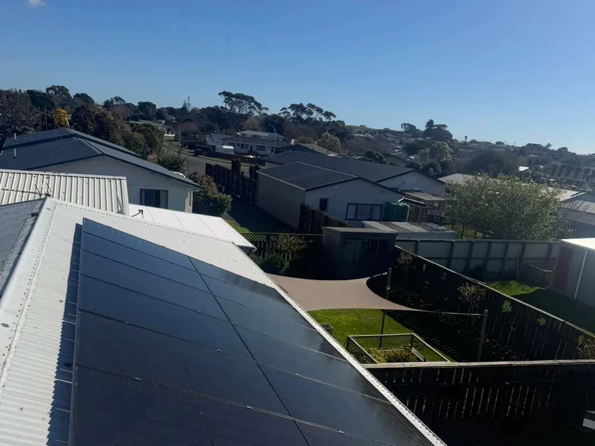 A 5.46kW EFS Solar array on a white metal roof in a New Plymouth suburb, Taranaki