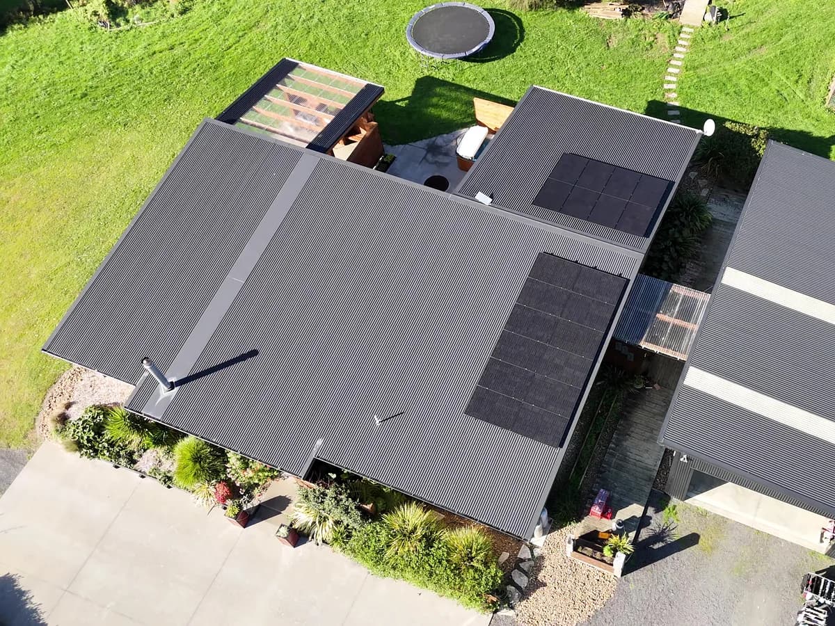 Aerial view of a finished 9.1kW EFS Solar array on a rural home near Raglan, Waikato