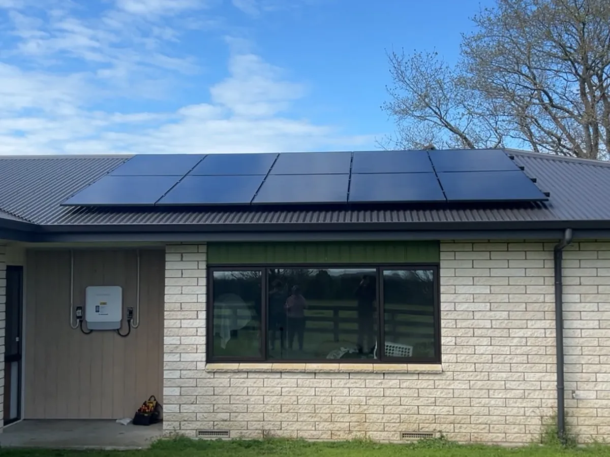 A 9.5kW EFS Solar array on the metal roof of a brick home at Springdale, Waikato