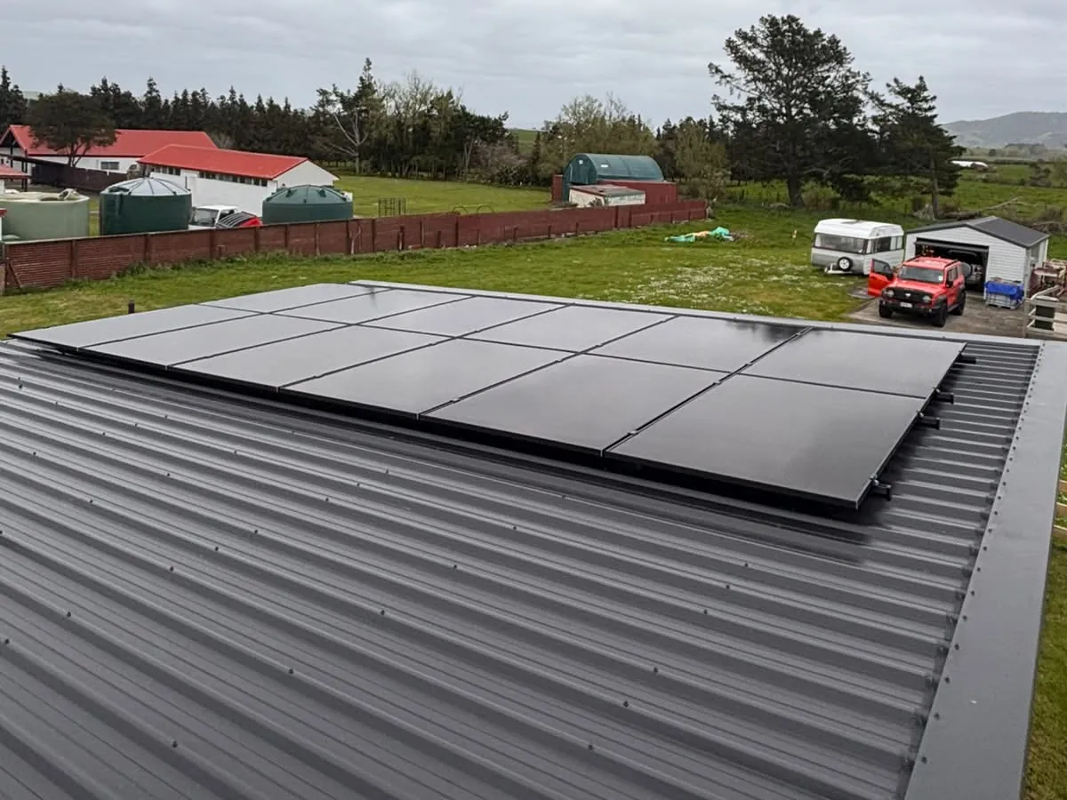 A 5.5kW EFS Solar array on a charcoal metal roof at a rural Tahuna property, Waikato