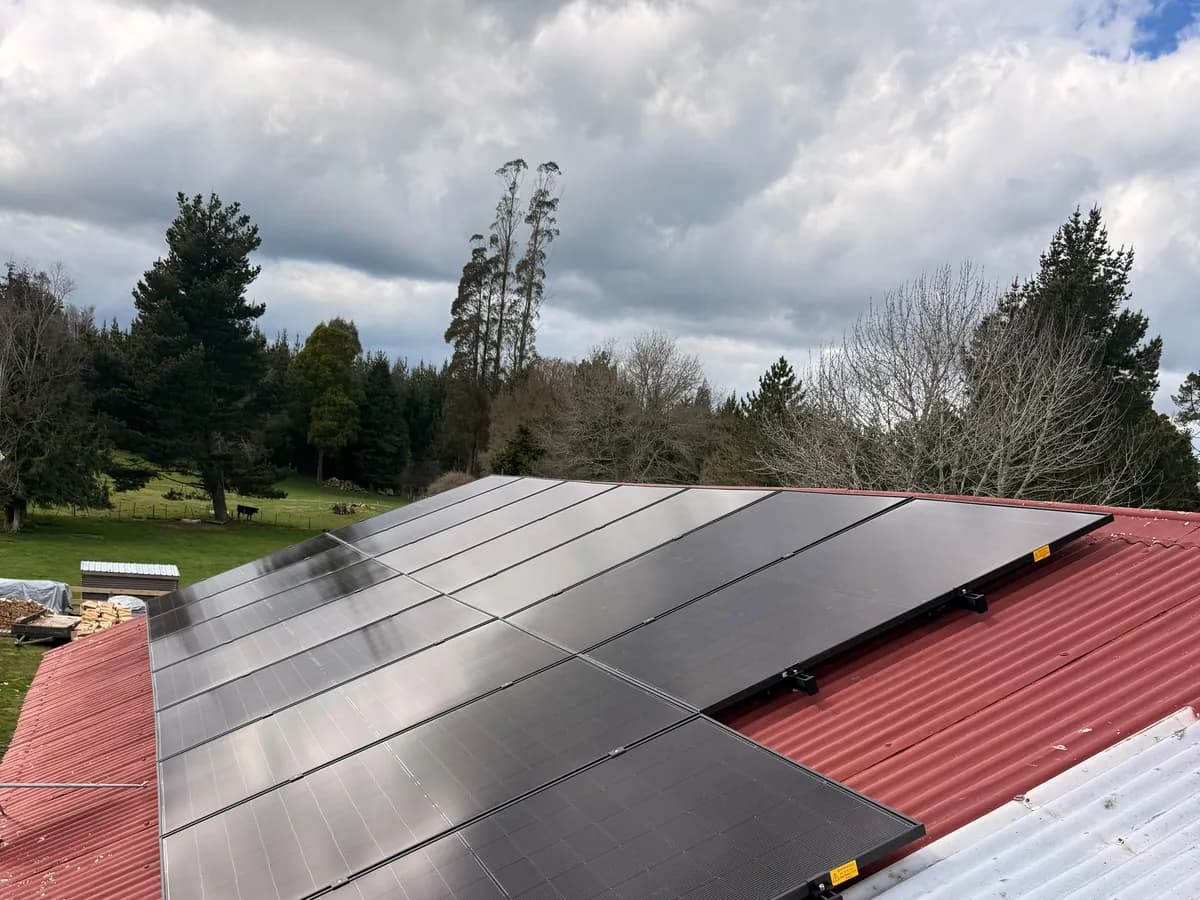 A 6.83kW EFS Solar array on a red roof at a rural Tokoroa property, Waikato